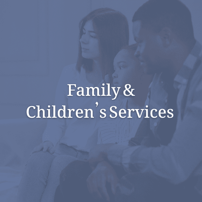 Family consisting of mother, father, and young daughter meeting with a mental health service provider. "Family and Children's Services" is overlayed on the image.